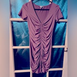 Adorable mauve adjustable dress.